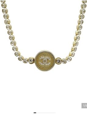 CHANEL Gold Crystal Logo Medallion Necklace